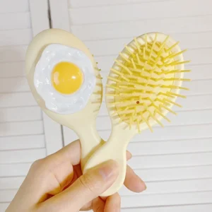 Lược Chải Tóc Mini Đệm Khí Hình Trứng Ốp La Cho Bé, Giao Mẫu Ngẫu Nhiên